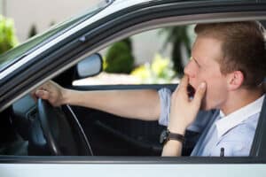 Bored man waiting in traffic jam