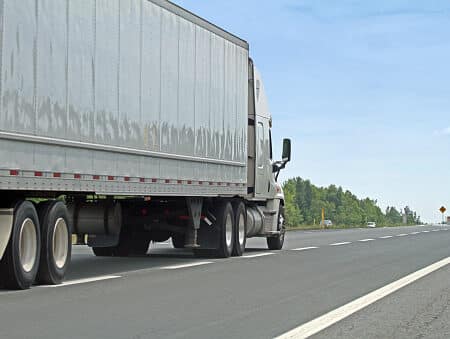Semi Truck Travelling On Interstate Highway