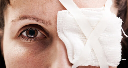 Medicine plaster patch on human injury wound eye